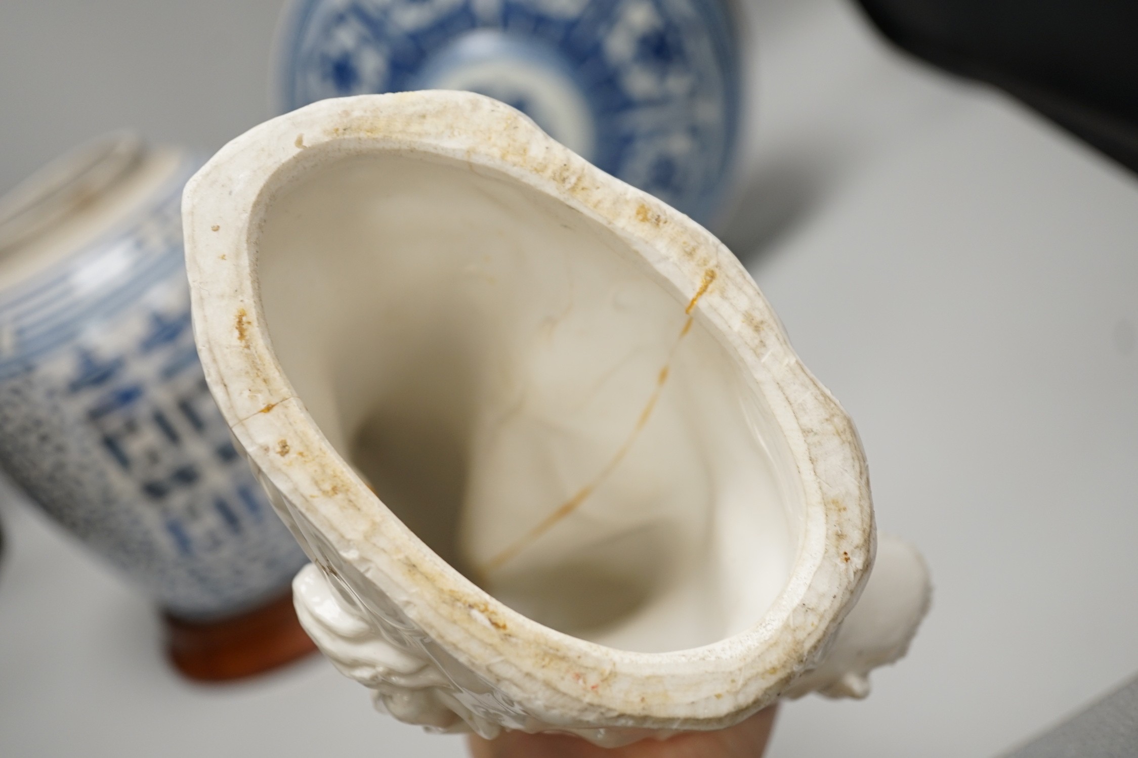A Chinese blue and white two handled moonflask, together with another Chinese vase and Chinese figure group, tallest 36cm